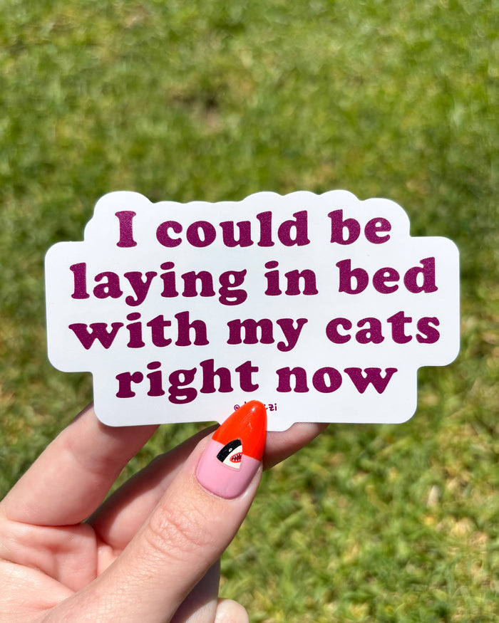 I Could Be Laying In Bed With My Cats Sticker