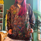 One of One: Happy Mess Confetti Chaos Smiley Zip-Up