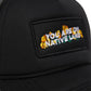 'YOU ARE ON NATIVE LAND' POPPY TRUCKER HAT