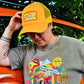 'YOU ARE ON NATIVE LAND' POPPY TRUCKER HAT