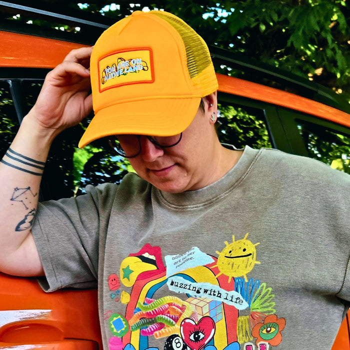 YOU ARE ON NATIVE LAND' POPPY TRUCKER HAT