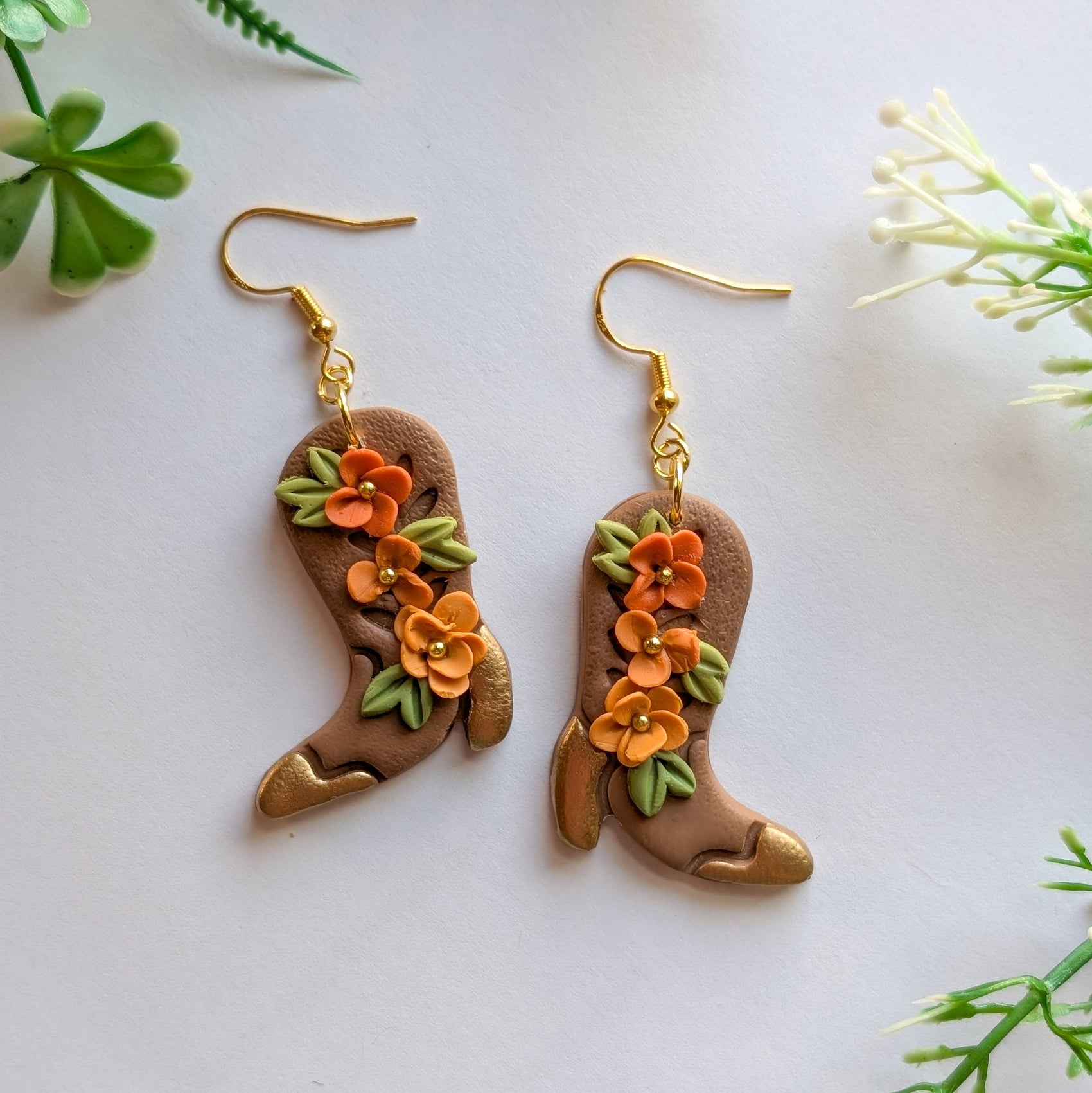 Floral cowboy boot earrings gold